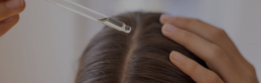 women using hair growth serum